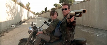 Edward Furlong as John Connor and Arnold Schwarzenegger as the Terminator in Judgment Day.